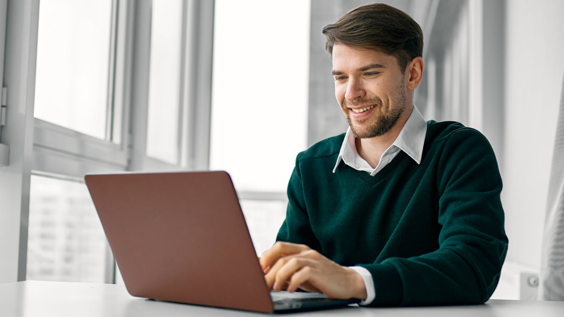 Business owner reviewing net-30 office supply accounts to build business credit